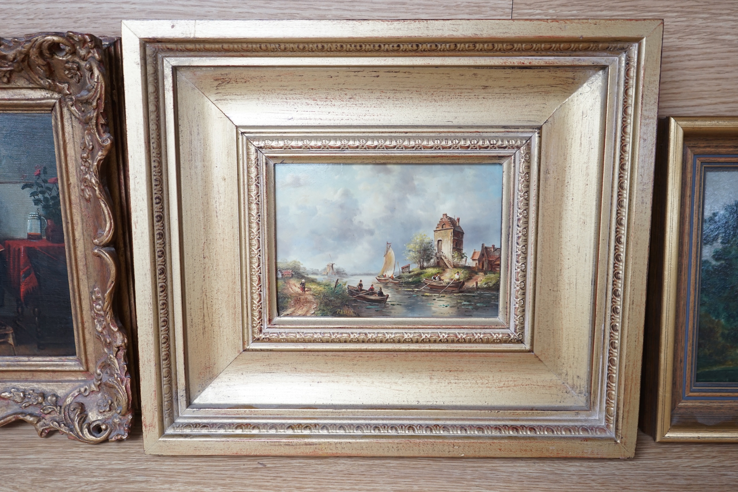 P Ruis, oil on board, Dutch riverscape with figures in rowing boats, signed, 11.5 x 16.5cm, gilt framed. Condition - good